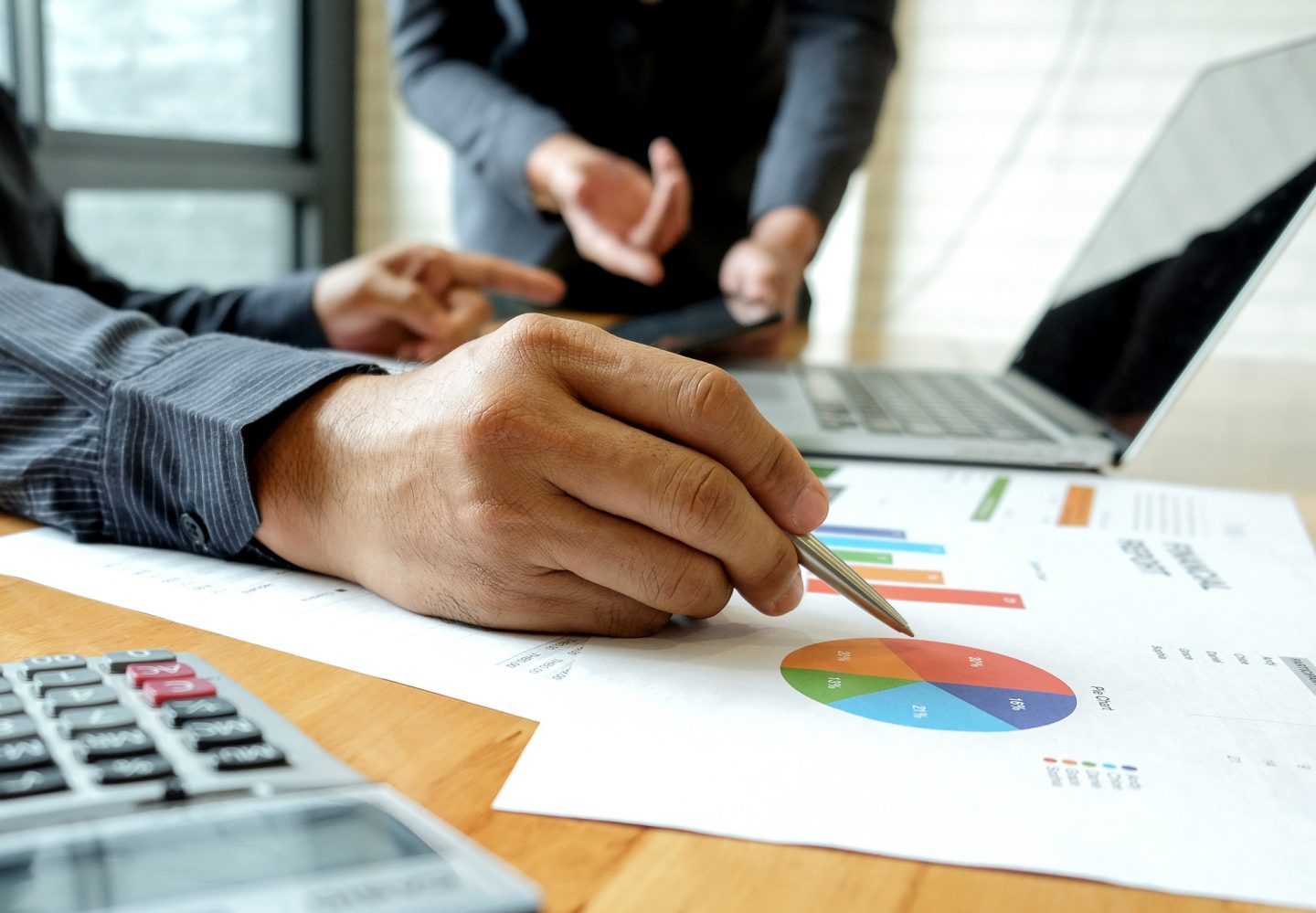 Office staff team is brainstorming on job analysis.